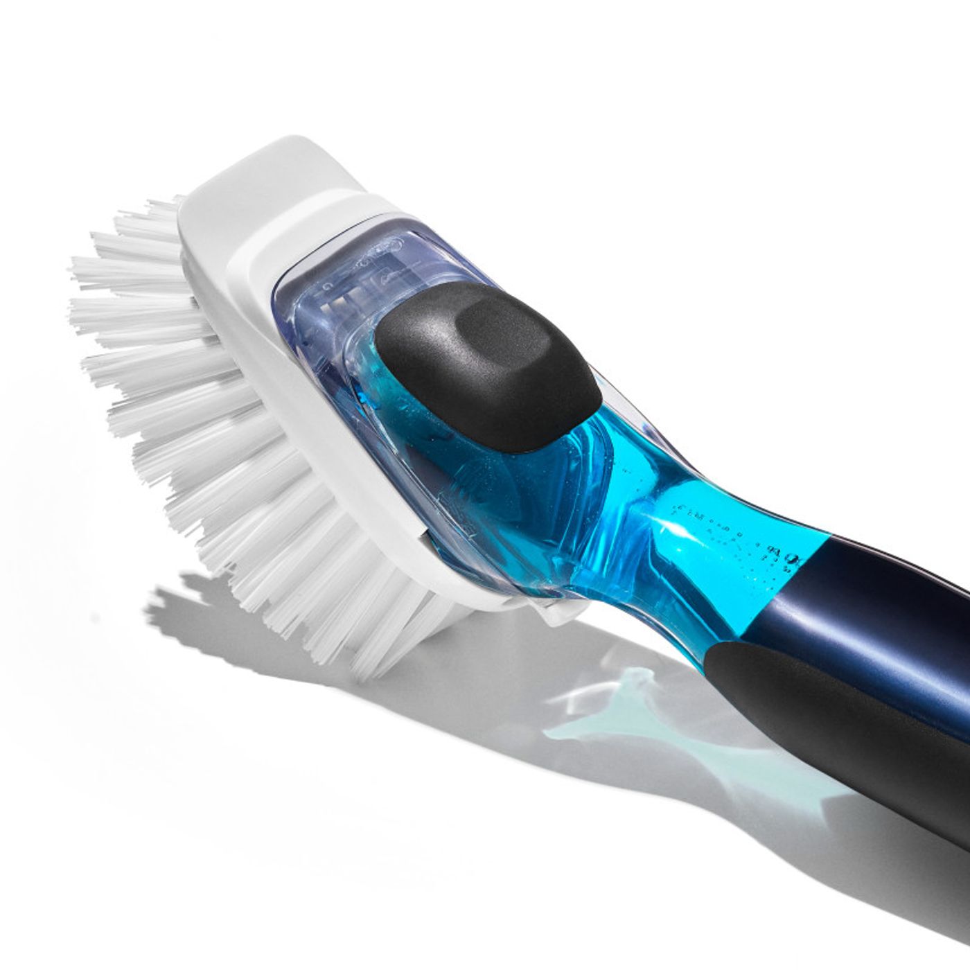 Brosse avec réservoir